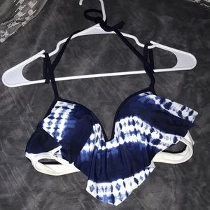 A tie dye looking bikini bra